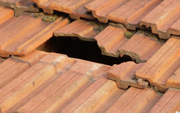 roof repair Rhodes, Greater Manchester